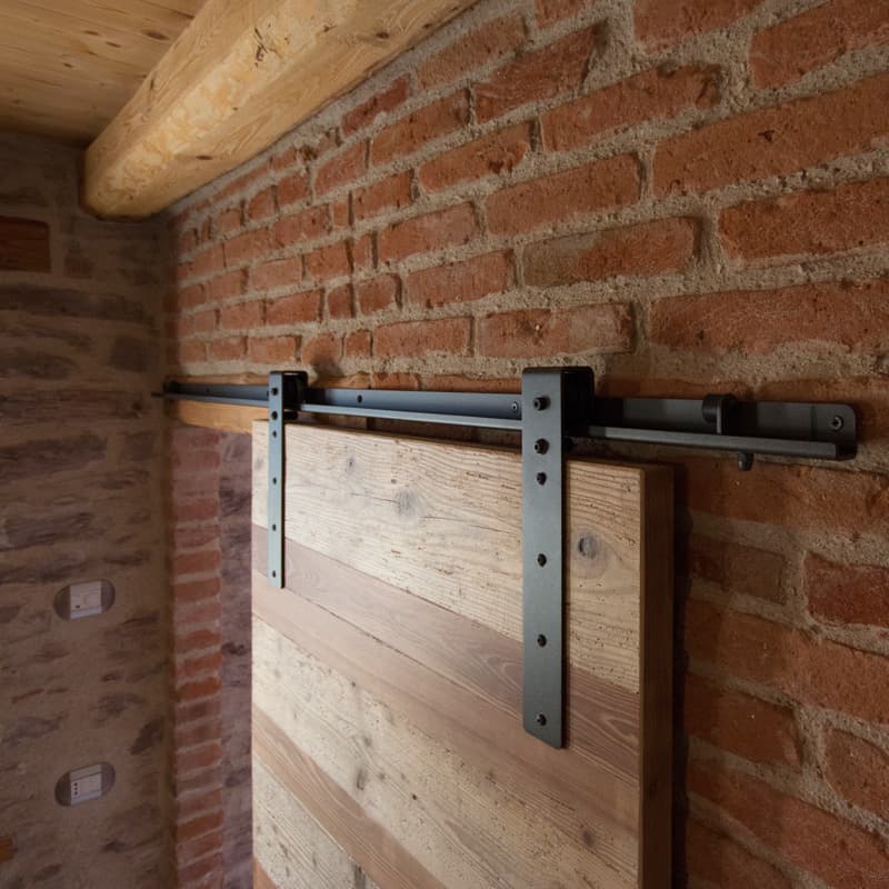 Sistema per porte scorrevoli in legno in Ferro - Immagine 1